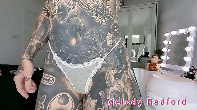 Revel in the Luscious Curves of Melody Radford in Her Micro Bikini and Lace G-String Try On Haul